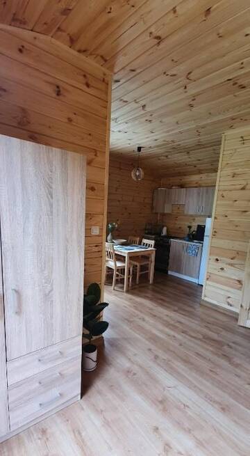 Фото номера Дом с 2 спальнями Дома для отпуска Domek drewniany nad jeziorem г. Zełwągi 19